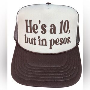 Brown and White Trucker Hat. He’s a 10 i